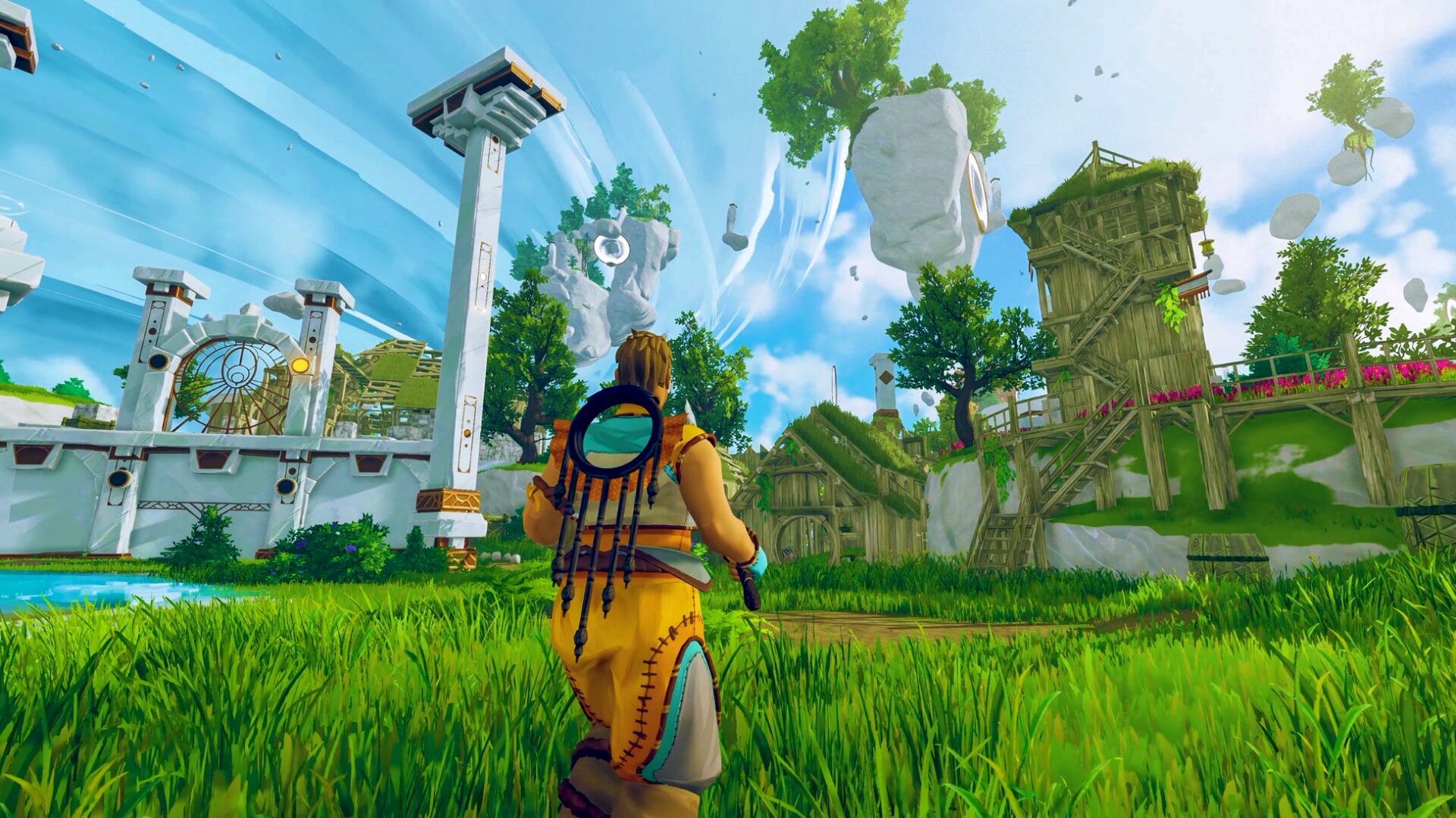 青空と緑の草原に浮かぶ島や白い柱の建造物を望むキャラクターの後ろ姿のゲーム画面