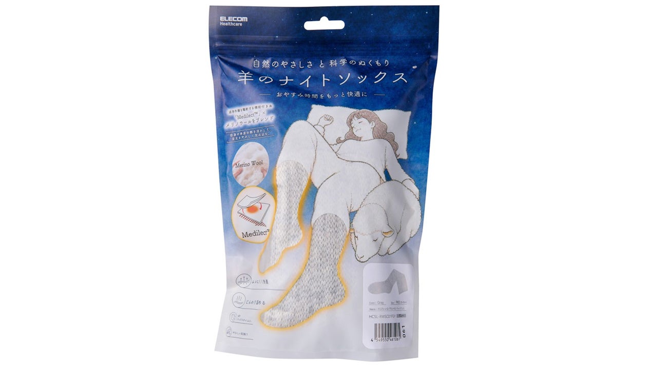 羊と就寝する人物のイラストが描かれた製品パッケージの表面
